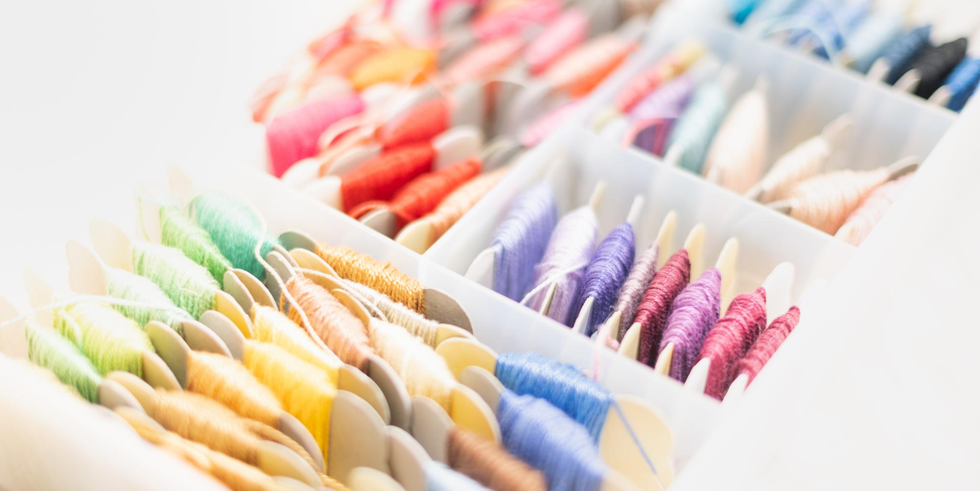 array of curated threads and sample swatches